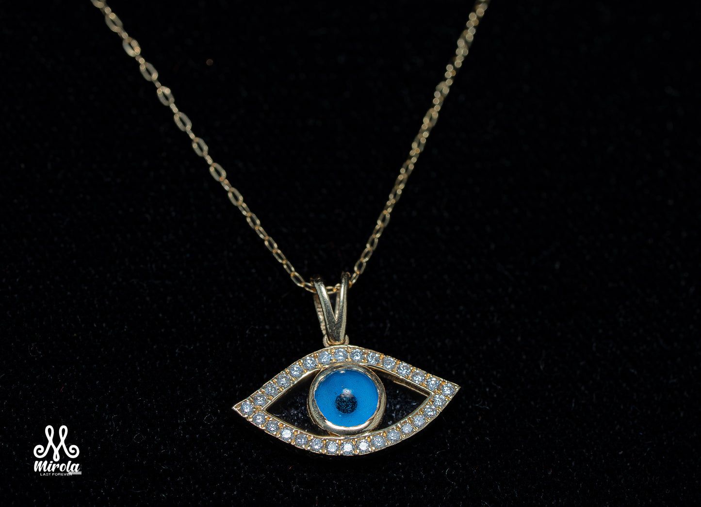 Evil Eye Diamond Pendant in 14 Karat Yellow Gold with 16-Inch Chain