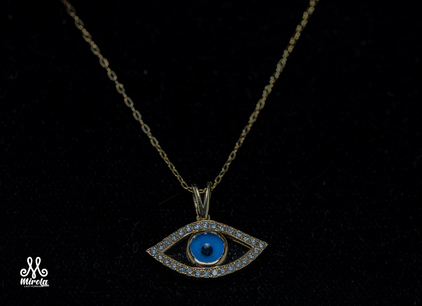 Evil Eye Diamond Pendant in 14 Karat Yellow Gold with 16-Inch Chain