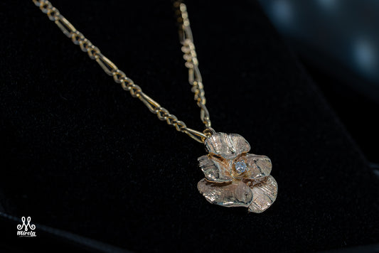 Flower with Single Diamond Stone Pendant in 14 Karat Yellow Gold