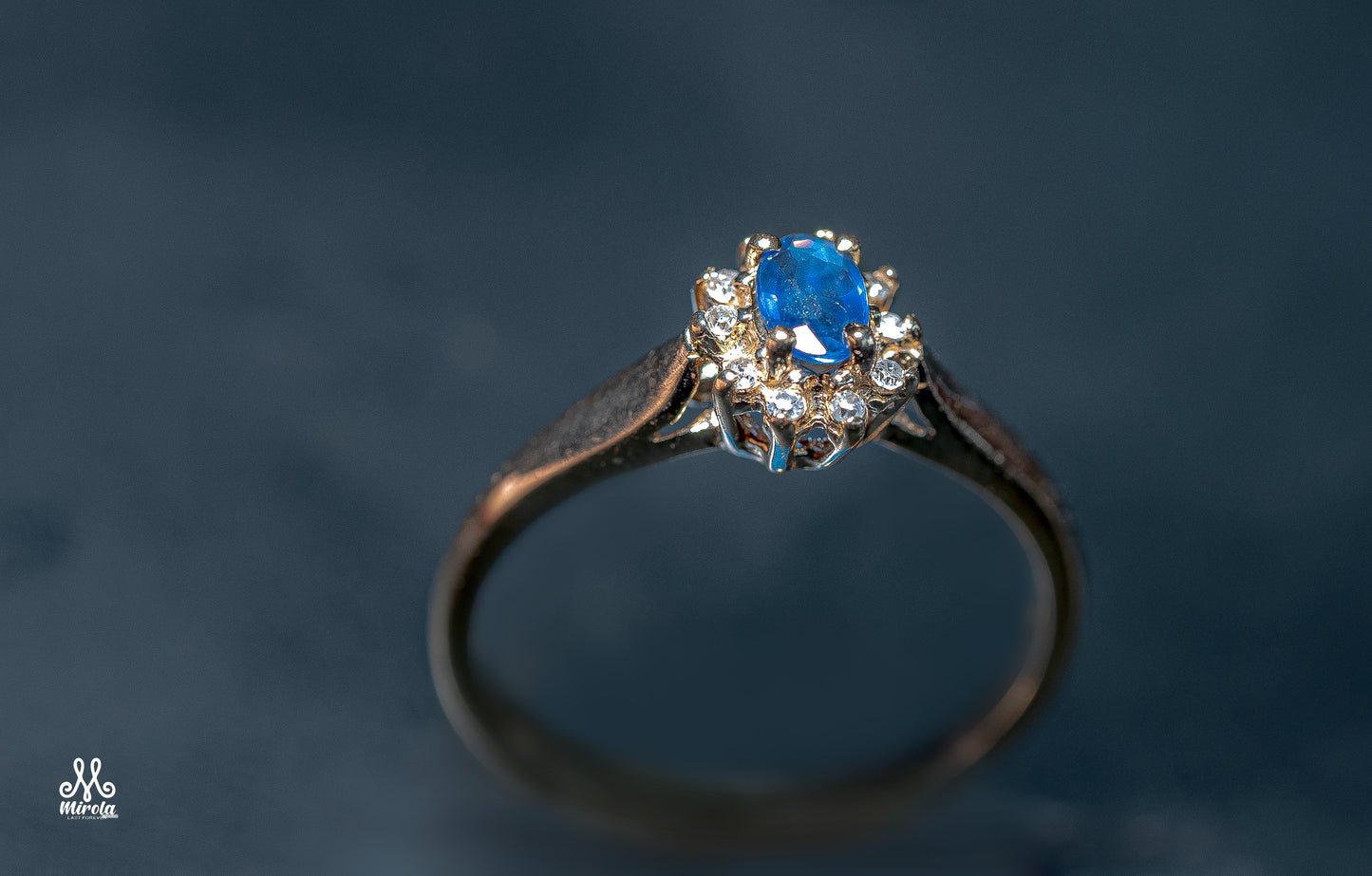 14K floral cluster design with blue sapphire and diamonds ring