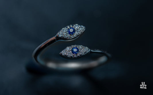 14K white gold ring with blue sapphire stones